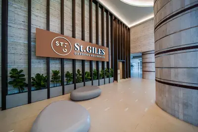 a lobby of a building with a sign on the wall at St Giles Gardens Residences Kuala Lumpur in Kuala Lumpur