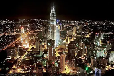a view of a city at night at Modern 2BR Fairlane Retreat Steps from Lot 10 in Kuala Lumpur