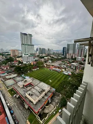 an aerial view of a soccer field in a city at The Luxe by Infinitum KLCC by CASABELLESTAY in Kuala Lumpur