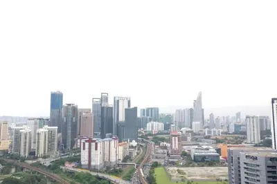 a view of a city with tall buildings at 3min Bangsar LRT-1 Station to KL Sentral-SuperView in Kuala Lumpur