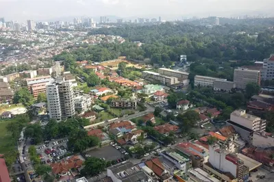 an aerial view of a city with buildings at 3min Bangsar LRT-1 Station to KL Sentral-SuperView in Kuala Lumpur