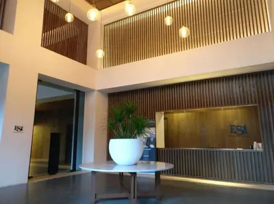 a plant sitting on a table in a lobby at 3min Bangsar LRT-1 Station to KL Sentral-SuperView in Kuala Lumpur