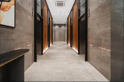 a corridor in a building with a long hallway at Trion klcc view apartment near TRX in Kuala Lumpur