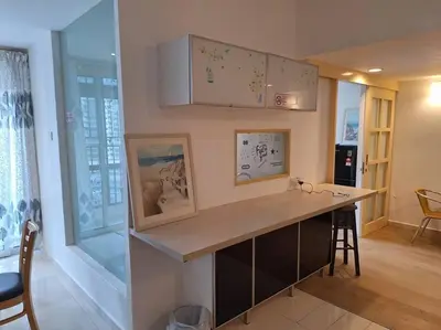 a kitchen with a counter top in a room at Fahrenheit, Stay in the Heart of KL, 15 pax in Kuala Lumpur
