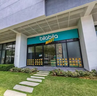 a jello mark store in front of a building at Chamber Suite Klcc & KL Tower view in Kuala Lumpur