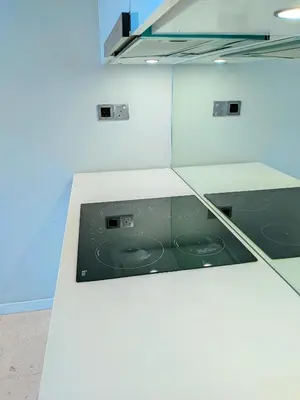 a kitchen with a counter top with a stove at vortex Suites KLCC in Kuala Lumpur