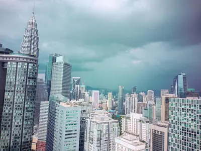 a view of a large city with skyscrapers at vortex Suites KLCC in Kuala Lumpur
