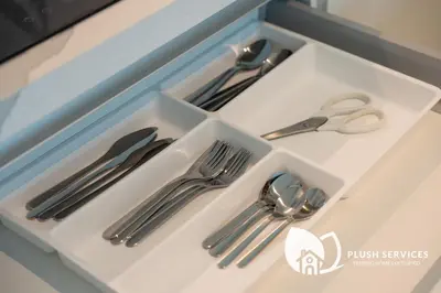 a drawer with silver utensils in it at Alfa Bangsar by Plush in Kuala Lumpur