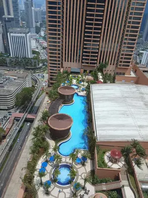 an aerial view of a water park in a city at Family Empire Suites At Times Square in Kuala Lumpur