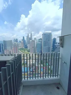 a balcony with a view of a city skyline at COL 23a8B Modern KLCC View Studio in Kuala Lumpur