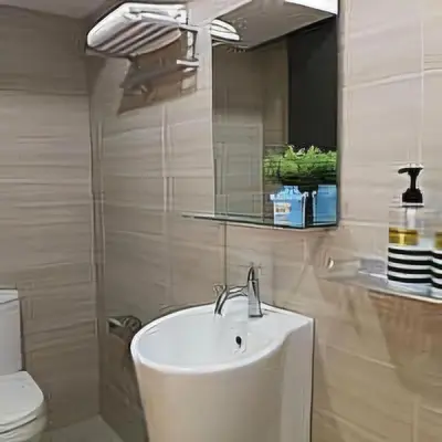 a bathroom with a sink and a toilet at 3 Towers Jalan Ampang KL in Kuala Lumpur