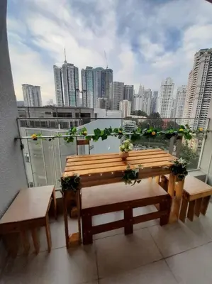 a balcony with benches and a view of a city at Cozy Idaman Robertson Suite Balcony in Kuala Lumpur