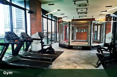 a gym with treadmills and a simulator in a building at 4B3R Lux Penthouse Astoria Ampang in Kuala Lumpur
