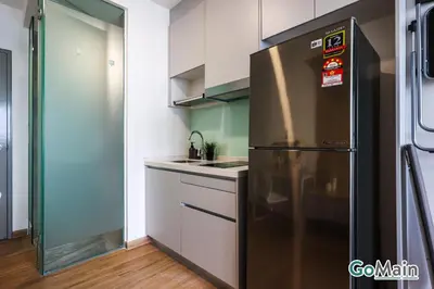 a kitchen with a stainless steel refrigerator at Skypool with KLCC View - KL Sentral Riveria City Suite Near KL City Centre KLCC in Kuala Lumpur