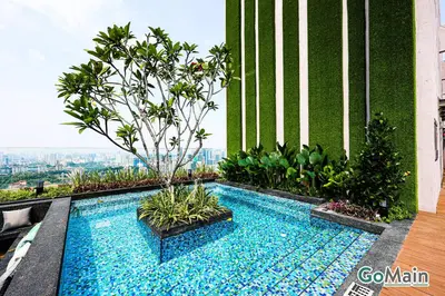 a swimming pool on the roof of a building at Skypool with KLCC View - KL Sentral Riveria City Suite Near KL City Centre KLCC in Kuala Lumpur