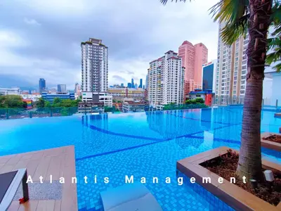 a large swimming pool in the middle of a city at TR Residence Block A,Titiwangsa in Kuala Lumpur