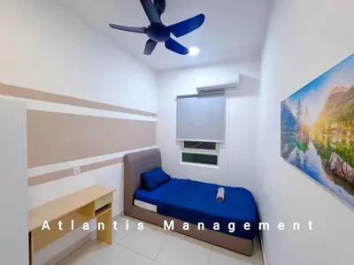 a bedroom with a blue bed and a ceiling fan at TR Residence Block A,Titiwangsa in Kuala Lumpur