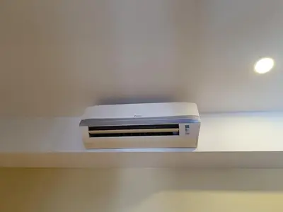 a radio sitting on top of a white shelf at Fahrenheit 88 in Kuala Lumpur
