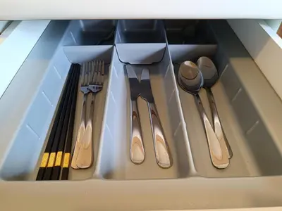 a drawer filled with utensils in a kitchen at Fahrenheit 88 in Kuala Lumpur