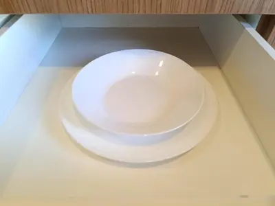 a white plate sitting on top of a table at Fahrenheit 88 in Kuala Lumpur