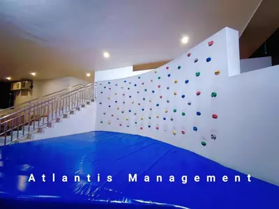 a room with a wall with a climbing wall at TR Residence Cozy & Luxury Apartment, Walking Distance MRT Titiwangsa & Nearby Titiwangsa Lake Garden in Kuala Lumpur