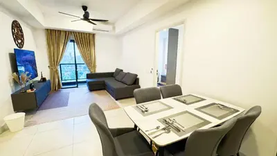 a dining room and living room with a table and chairs at The Atrium Ampang KLCC City , 55000Jalan Ampang Hilir, Taman U Thant KLCC in Kuala Lumpur