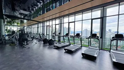 a gym with a row of treadmills and machines at The Atrium Ampang KLCC City , 55000Jalan Ampang Hilir, Taman U Thant KLCC in Kuala Lumpur