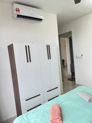 a bedroom with a bed and a white cabinet at Cozy Kenwingston Platz KL 2-5 Pax2BR&2BR PakinNetf 4305A in Kuala Lumpur