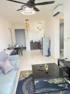 a living room with a couch and a table at Cozy Kenwingston Platz KL 2-5 Pax2BR&2BR PakinNetf 4305A in Kuala Lumpur