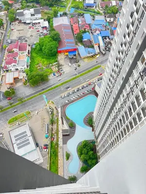 an aerial view of a city with a river and a building at Cozy Kenwingston Platz KL 2-5 Pax2BR&2BR PakinNetf 4305A in Kuala Lumpur