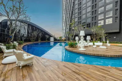 a swimming pool in a city with buildings at Gaming World Suite In Arte Mont Kiara in Kuala Lumpur