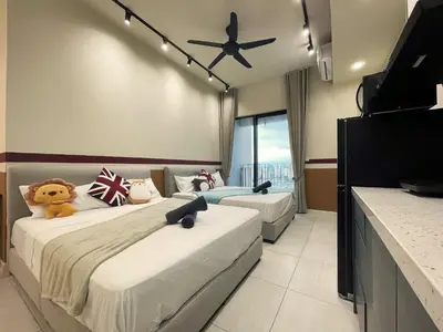 a bedroom with two beds and a ceiling fan at The Pano at Jalan Ipoh Near KLCC By The Homez in Kuala Lumpur