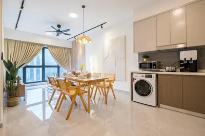 a kitchen and dining room with a table and chairs at Agile Bukit Bintang by Feel Home in Kuala Lumpur
