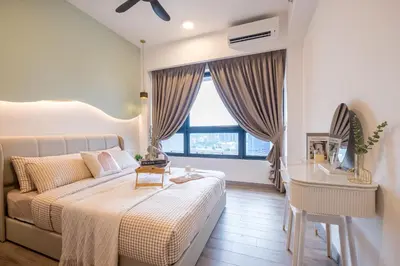 a bedroom with a bed and a desk and a window at Agile Bukit Bintang by Feel Home in Kuala Lumpur