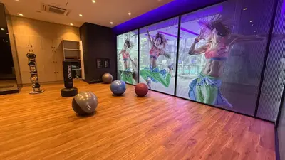 a bowling alley with a video game on the screen at Star Residence KL in Kuala Lumpur