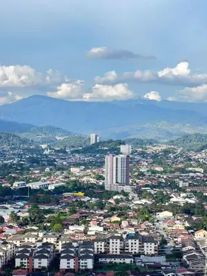 an aerial view of a city with buildings and mountains at Cozy Kenwingston Platz KL 2-5 Pax2BR & 2BR FrePakin Netflix 3803 in Kuala Lumpur