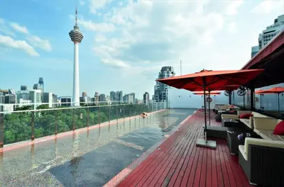 a pool on a building with a view of a city at M101 Sky Suites at Dang Wangi KLCC in Kuala Lumpur