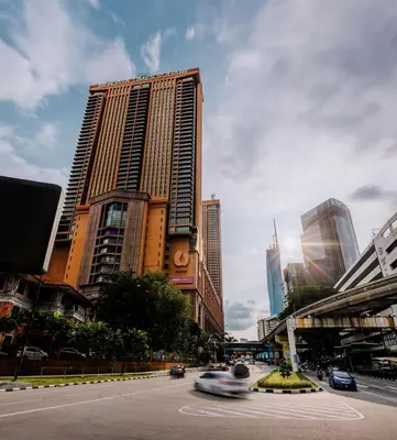 a city with tall buildings and a street with cars at Cemara Premier Residence Ampang Near KLCC Kuala Lumpur in Kuala Lumpur