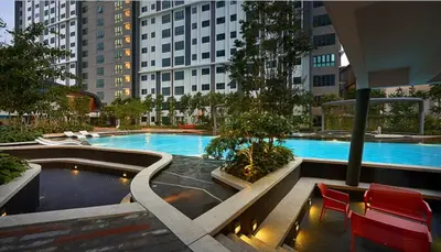 a large swimming pool in a city with buildings at M Centura Sentul Kuala Lumpur, Fully Air-Con 2-Bedroom Home in Kuala Lumpur