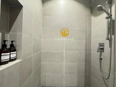 a bathroom with a shower stall with a shower at 8 Kia Peng Suites KLCC By HeyStay Management in Kuala Lumpur