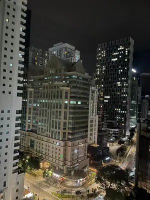 a view of a city at night with tall buildings at Vortex Suites KL33 in Kuala Lumpur
