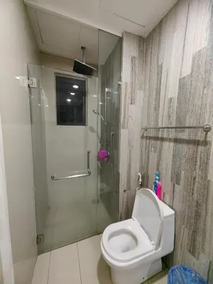 a bathroom with a shower with a toilet and a glass shower stall at M CITY 2 Bed KLCC BY D in Kuala Lumpur