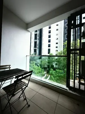a empty room with a bench and a large window at M CITY 2 Bed KLCC BY D in Kuala Lumpur