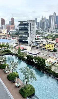a view of a city with a pool of water at The Home by Fidi at Continew Residence in Kuala Lumpur