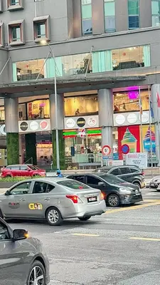 a group of cars parked in front of a building at The Atrium at Jalan Ampang by OKBnB - 3Bedroom Apartment with FREE WiFi & Carpark in Kuala Lumpur