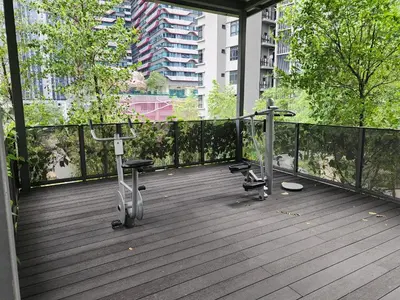 a balcony with two exercise equipment on a building at Astoria 4r3b 5minsklcc bathtub waterfilter newcondo bigbalcony in Ampang