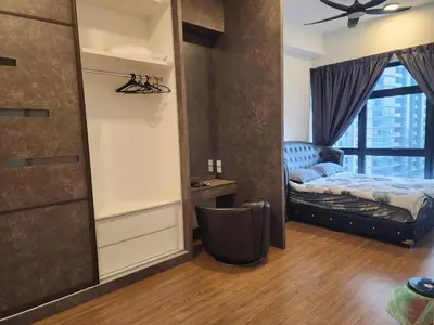 a small bedroom with a bed and a window at Astoria 4r3b 5minsklcc bathtub waterfilter newcondo bigbalcony in Ampang