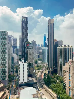 an aerial view of a city with tall buildings at Vortex Suites klcc By Sky House in Kuala Lumpur
