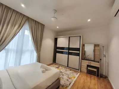 a bedroom with a large white bed and a mirror at Quill Residences KLCC, Fortune in Kuala Lumpur