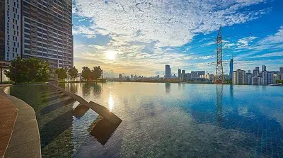 a large body of water with a city in the background at The E48-10 Stay in Kuala Lumpur